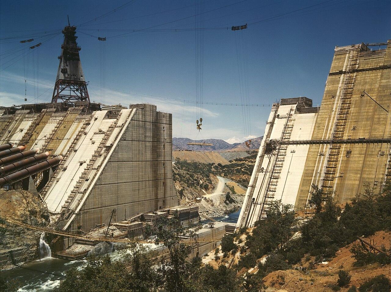 Shasta Dam under construction in 1942, showing the scale of infrastructure projects that require cost estimating